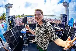 Tiesto performing at beach party in Great Stirrup Cay during Groove Cruise Miami 2024