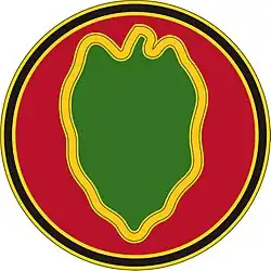 A red circle with a black outline containing a green leaf shape with a yellow outline