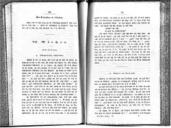 An open book with serif font