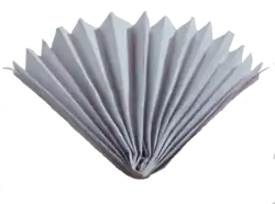 A homemade hand fan made with paper