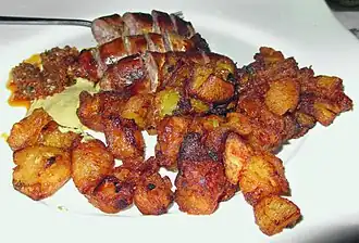 Sausage and alloco (plantain banana), Abidjan (Ivory Coast)
