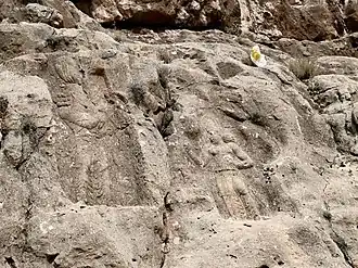 Second Barm-e Delak relief of Bahram II making gesture of piety, whilst being offered a diadem by a courtier