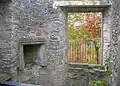 The old fireplace and the viewing or projection window from the inside.