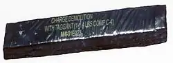 A 1.25&nbsp;lb (570&nbsp;g) demolition charge of C4 explosive