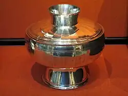 One of the hemispherical covered bowls