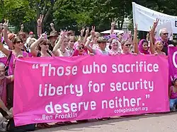 Code Pink activists demonstrate in front of the White House on July 4, 2006.