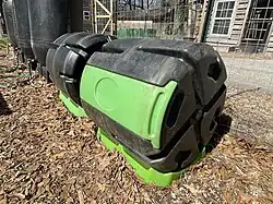 Compost rollers are used to cleanly produce rich, organic compost for sustainable gardens.&nbsp; Food waste, veggie scraps, grass clippings, cardboard, biochar, leaves and other biomass are mixed together.&nbsp; These inputs have varying levels of carbon and nitrogen which are required for producing compost.&nbsp; Microbes and insects break down these inputs into a rich soil amendment to help fertilize plants sustainably.
