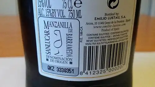 Official DO label Manzanilla on the back of a Sanlúcar de Barrameda region wine bottle