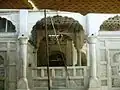 The cenotaph is surrounded by carved marble screens