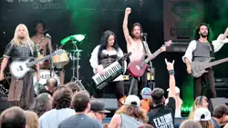 Distoriam performing in Waterloo, QC promoting Chapter I: Vinlanders, July 16th, 2016. From left to right: Tommy Dufault, Marc-André Lépine (Ex Member), Sabrina Mazerolle (Ex Member), Jean-Christophe Arsenault (Ex Member) and Yann Pouliot (Ex Member). Not in the picture: Francis Beaudet, Dominic Bourke