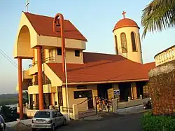 Syrian Orthodox Church near Goan Residential Resort Private Limited.
