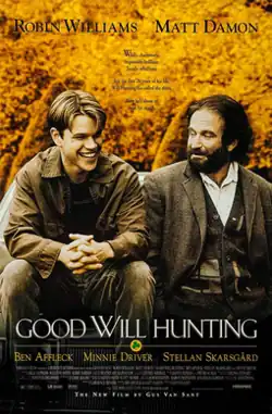 Matt Damon and Robin Williams sitting together on a bench, the background is full of yellowed leaves.