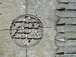 Decaying wood inlay on a chest in a Greek monastery.