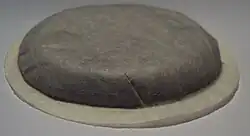 A Senseo ESE coffee pod, upside down