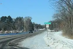 Looking north at the sign for Knowlton on County DB