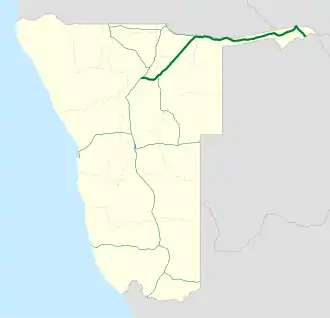 Map of Namibia with a long green line running from the north to the south of the country, with one section of the line coloured blue instead. The green sections of the line signifies the B1.