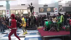 Peelander-Z performing at the Asian Heritage celebration in New York; left to right: Peelander Pink, Peelander Yellow and Peelander Green