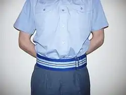 ROC stable belt, worn with service working dress 2b, (short sleeve order), incorporating the colours of the ROC medal ribbon.