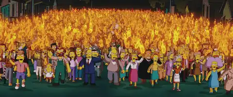 Lots of angry people holding flaming torches as they march together