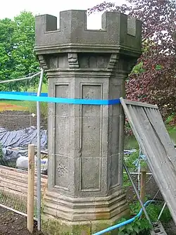 One of the smaller towers with subtle design and carving differences suggesting a later date of construction