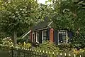 House hidden in the green